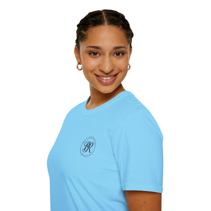 Person wearing a light blue t-shirt with a logo on a white background