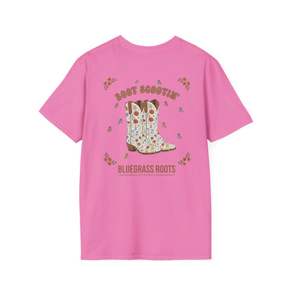 Pink t-shirt with a cowboy boot graphic and text on a white background