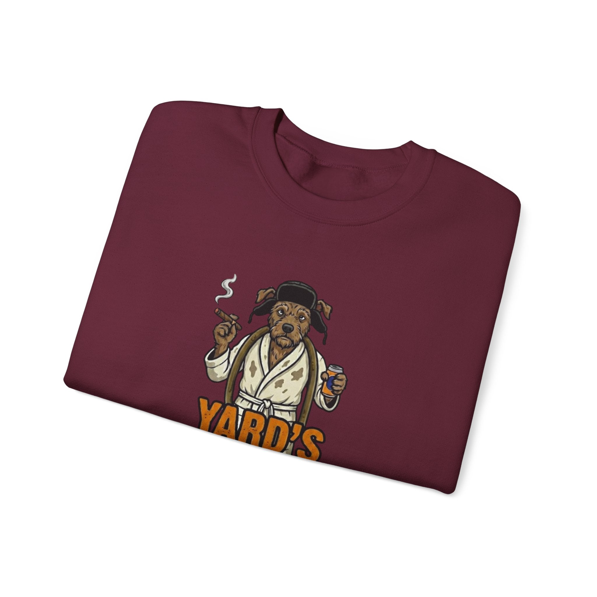 Folded maroon sweatshirt with a bear graphic and 'Yard's' text on a white background