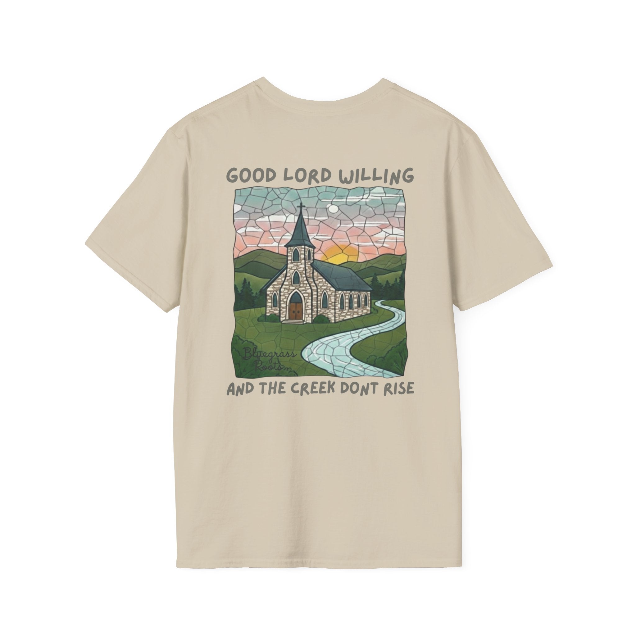 Beige t-shirt with a graphic of a church and landscape on the back, on a white background.