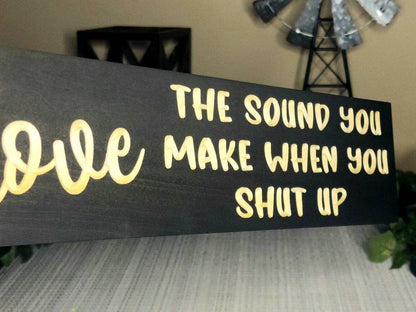 Bold and humorous wooden sign for playful home decor or quirky office accents.