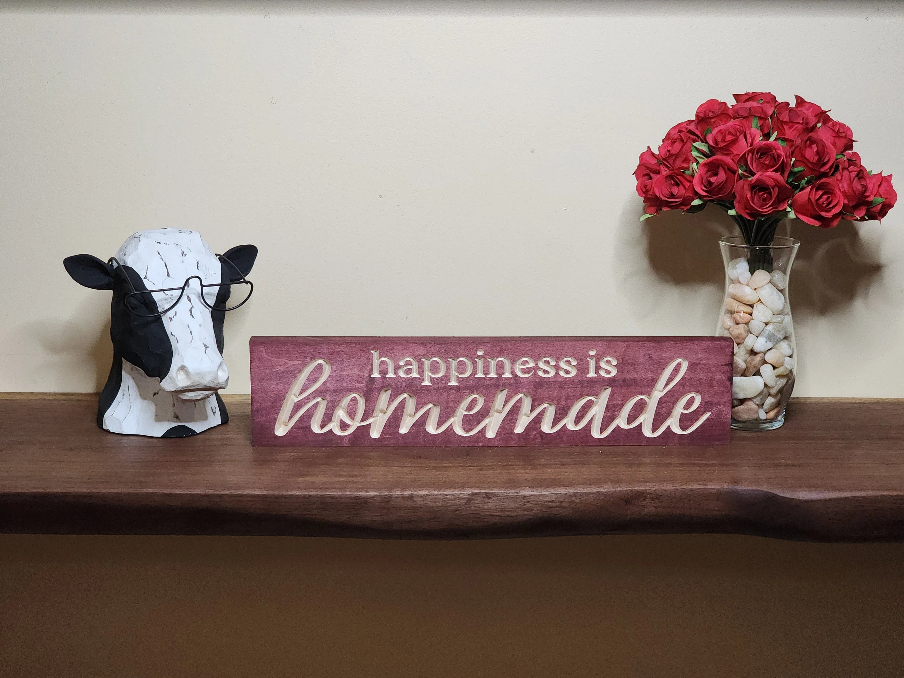 Cozy family kitchen decor ideas with a farmhouse style wooden sentiment sign.

