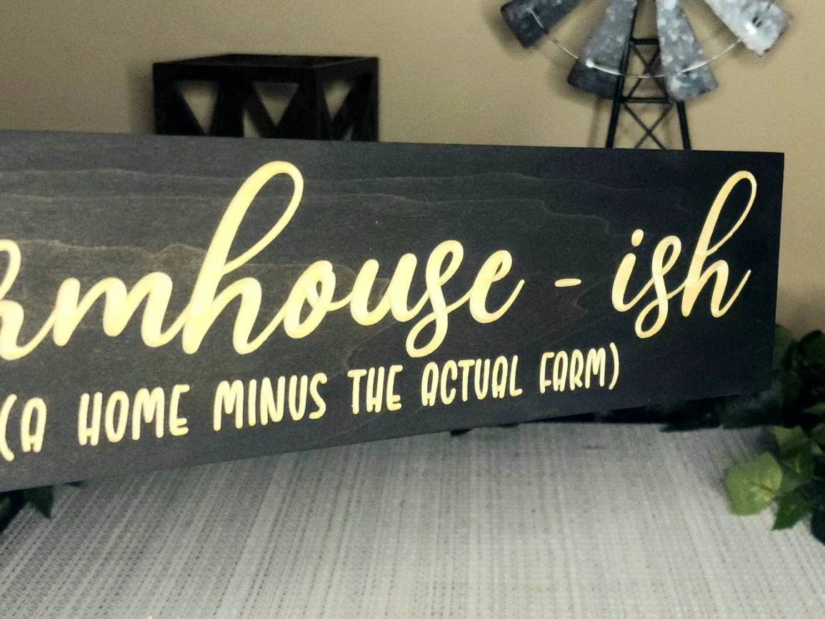 Decorative farmhouse wall sign in a farmhouse-style living room with witty rustic charm.

