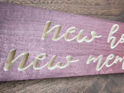 Decorative wooden sign for living room showcasing new beginnings.
