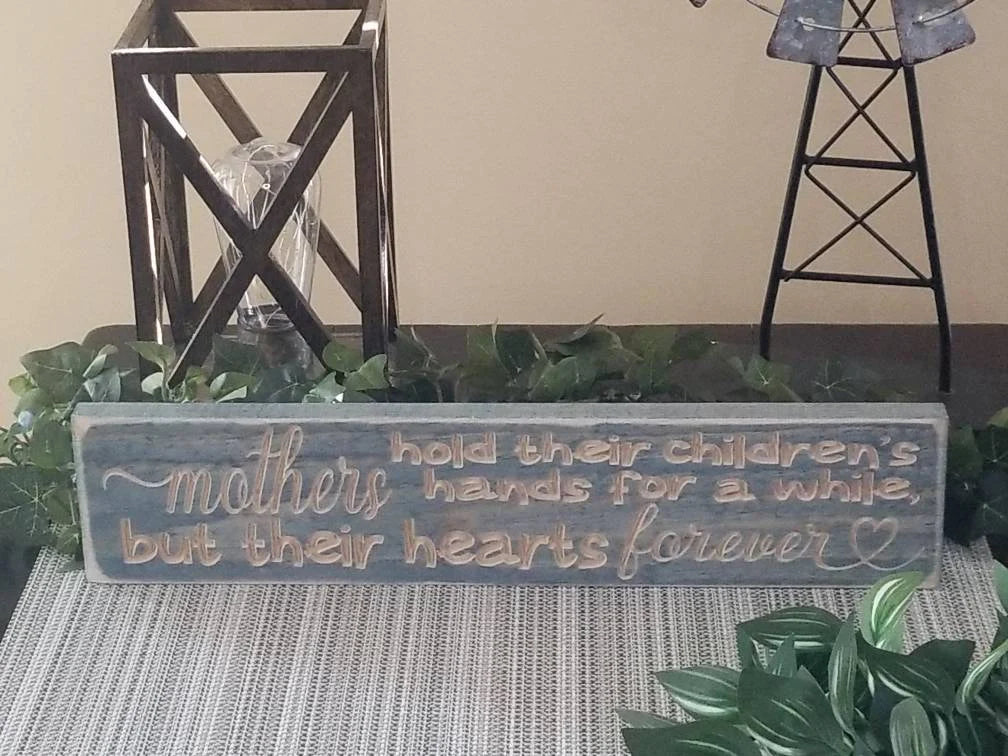 Farmhouse mother sign, mom sign decor, emotional mother sign, sentimental wood sign for mom, mother-child bond wall art.
