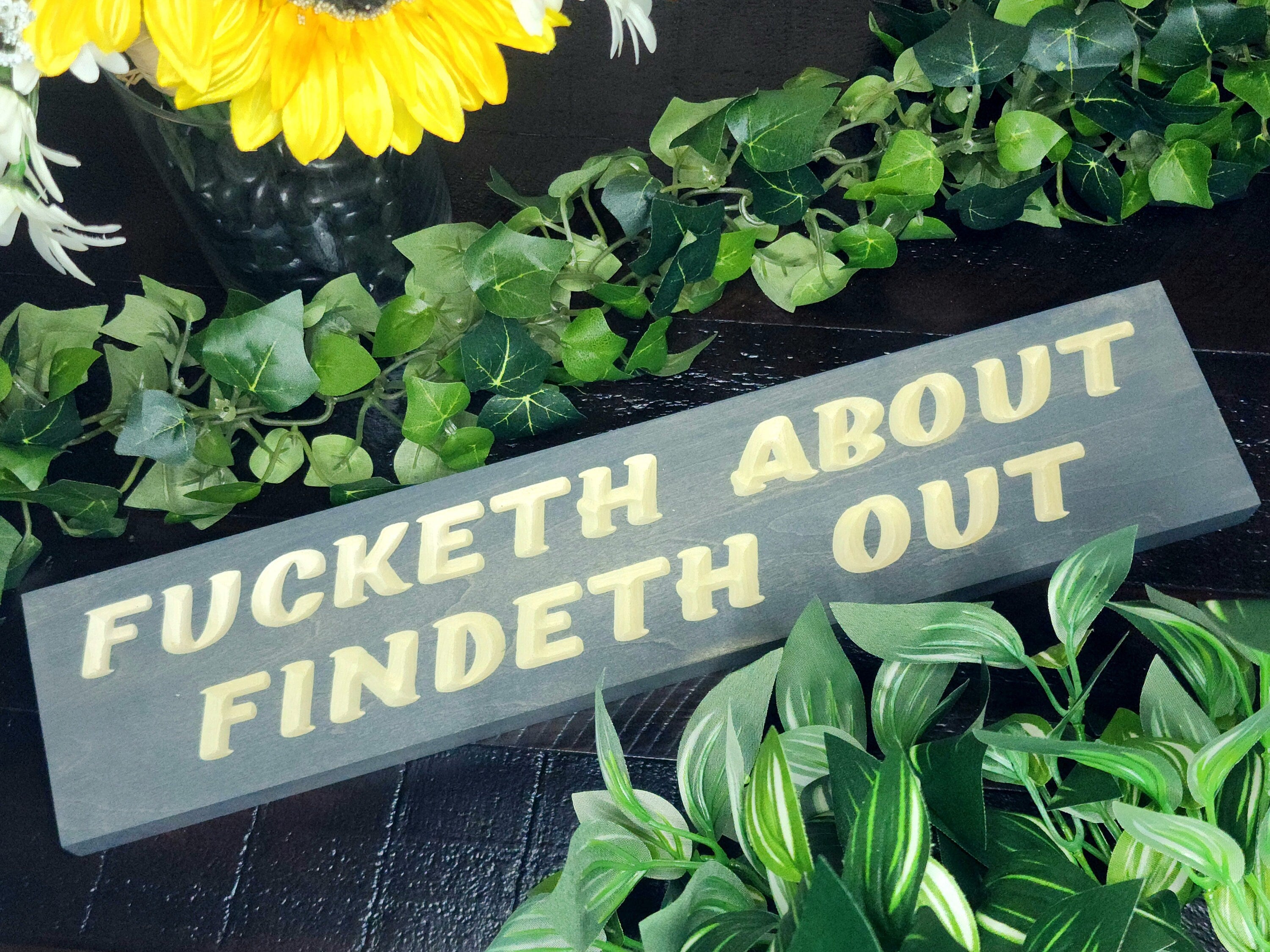 Fucketh About Findeth Out wood sign for bold and funny wall art.
