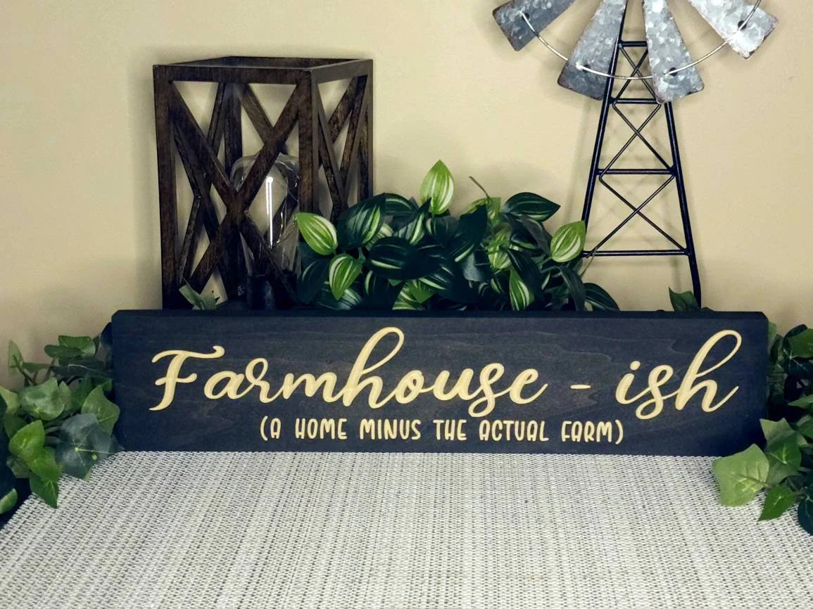 Funny farmhouse sign styled in a cozy urban farmhouse-inspired entryway.
