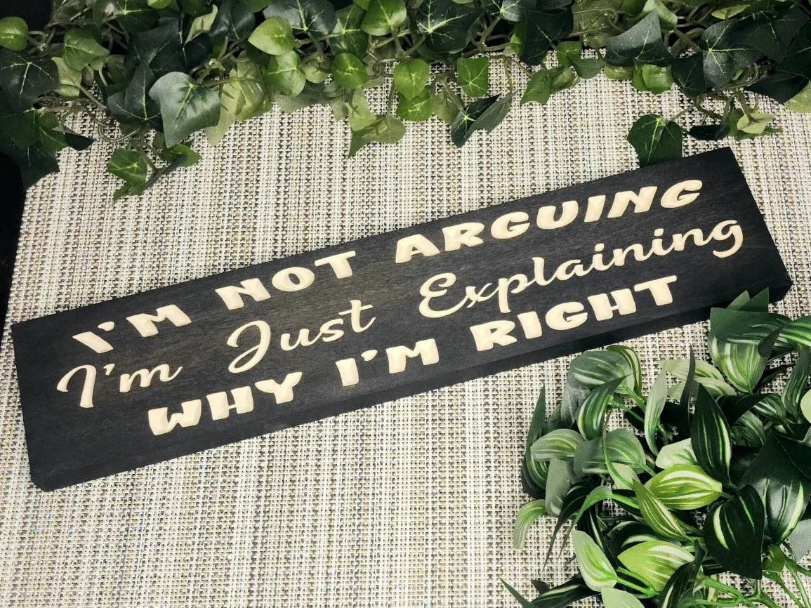 Funny home sign reading I’m Not Arguing, I’m Just Explaining Why I’m Right as witty home decor.
