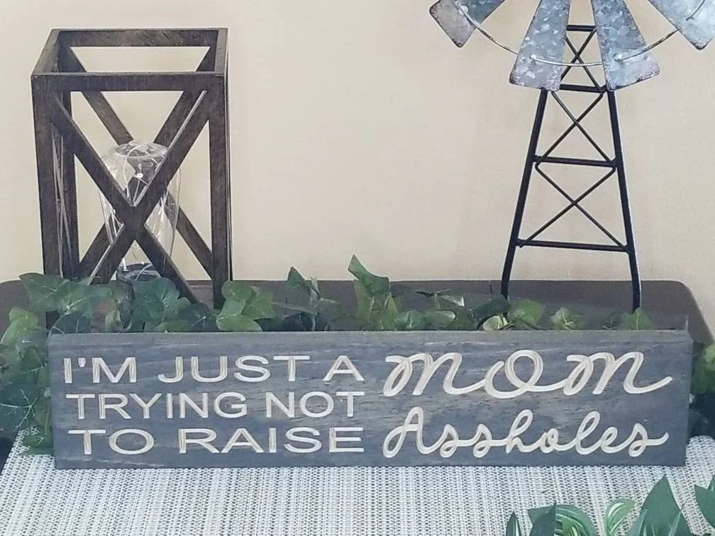 Funny mom wall art with relatable parenting quote for moms with a sense of humor.
