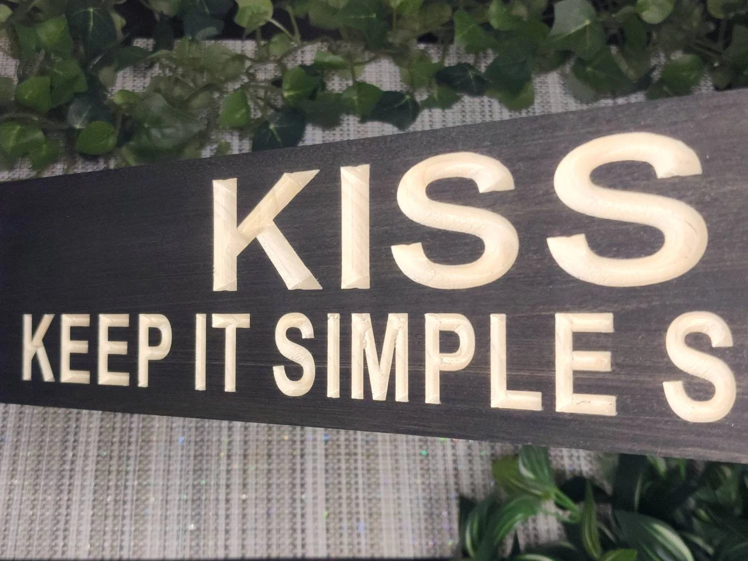Funny office sign with the K.I.S.S. principle for entrepreneurs.
