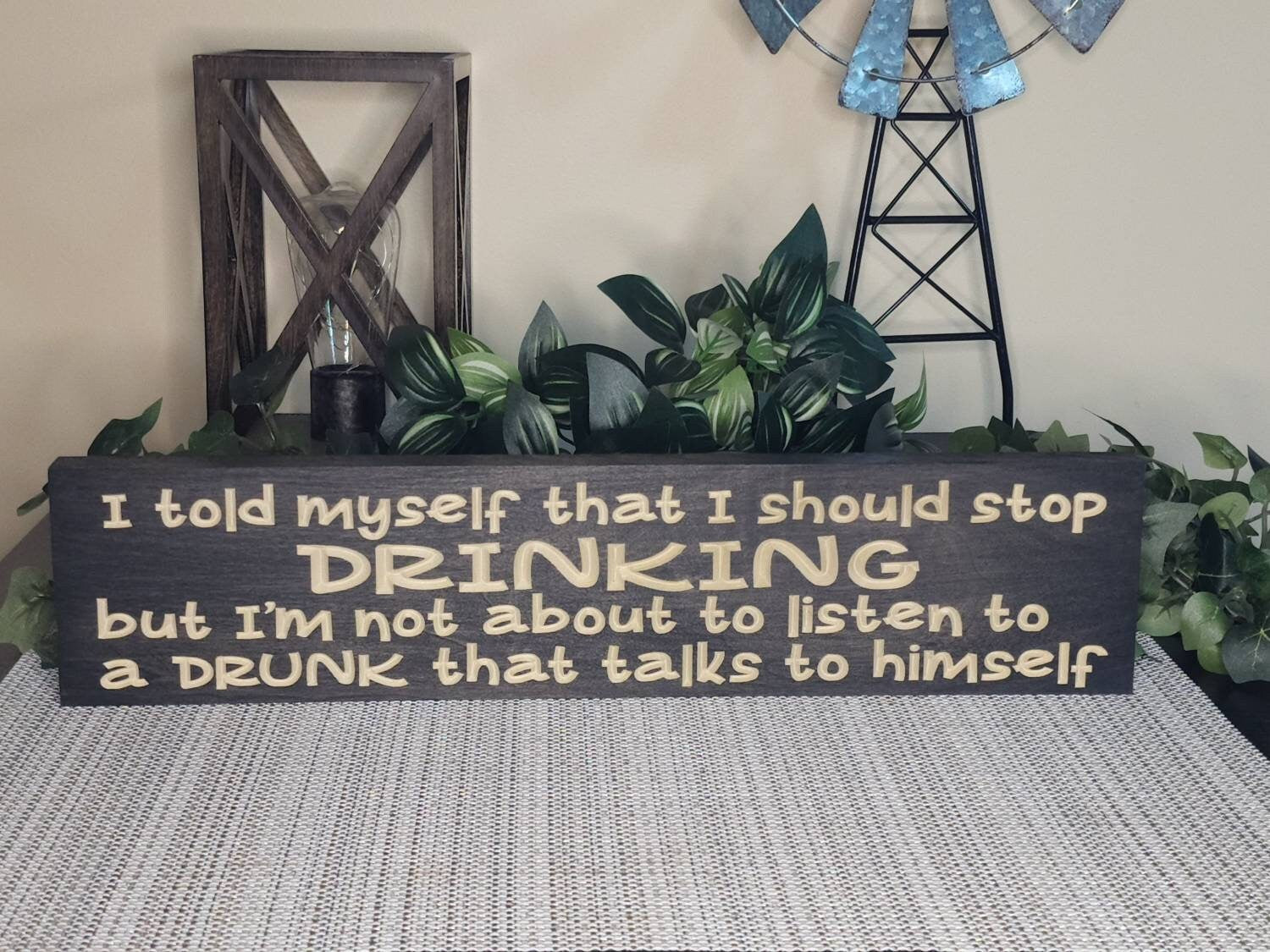 Humorous bar wall decor sign for entertaining spaces and man caves.
