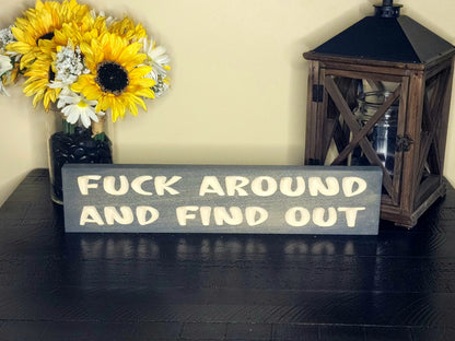 Humorous fuck around and find out wall art for man cave or garage decor.