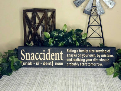 Humorous pantry sign with self-deprecating humor for snack enthusiasts.
