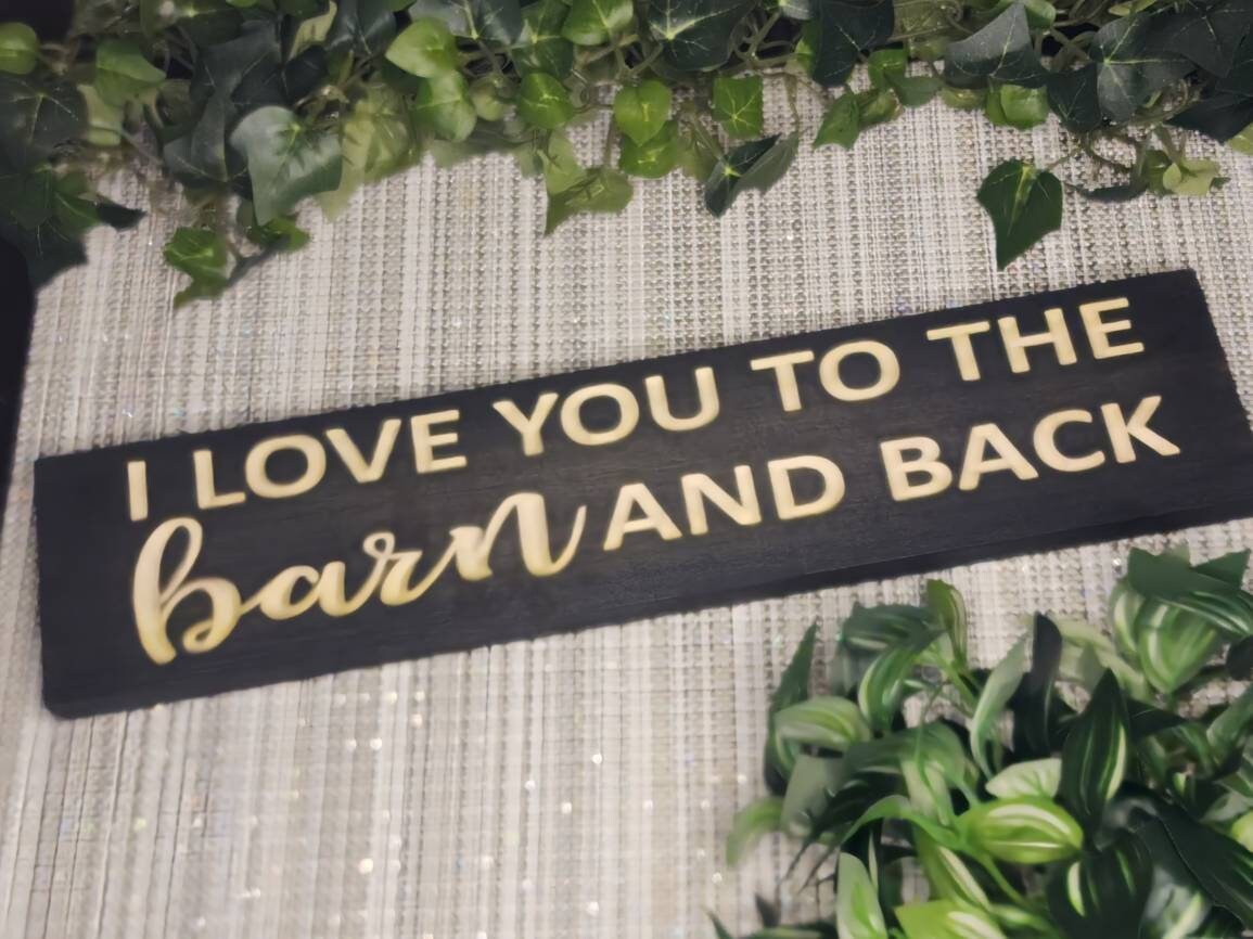 I Love You to the Barn and Back rustic wood sign for farmhouse wall art and country love decor.
