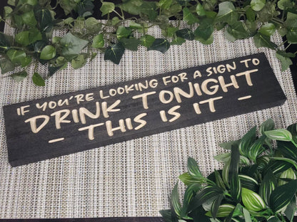 If You’re Looking for a Sign to Drink Tonight wood sign for funny bar decor.
