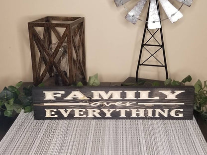 Inspirational family wall decor with a heartfelt quote, perfect for entryways.
