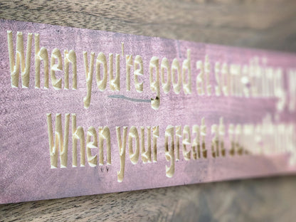 Inspirational office wall decor with success quote and elegant wood finish.
