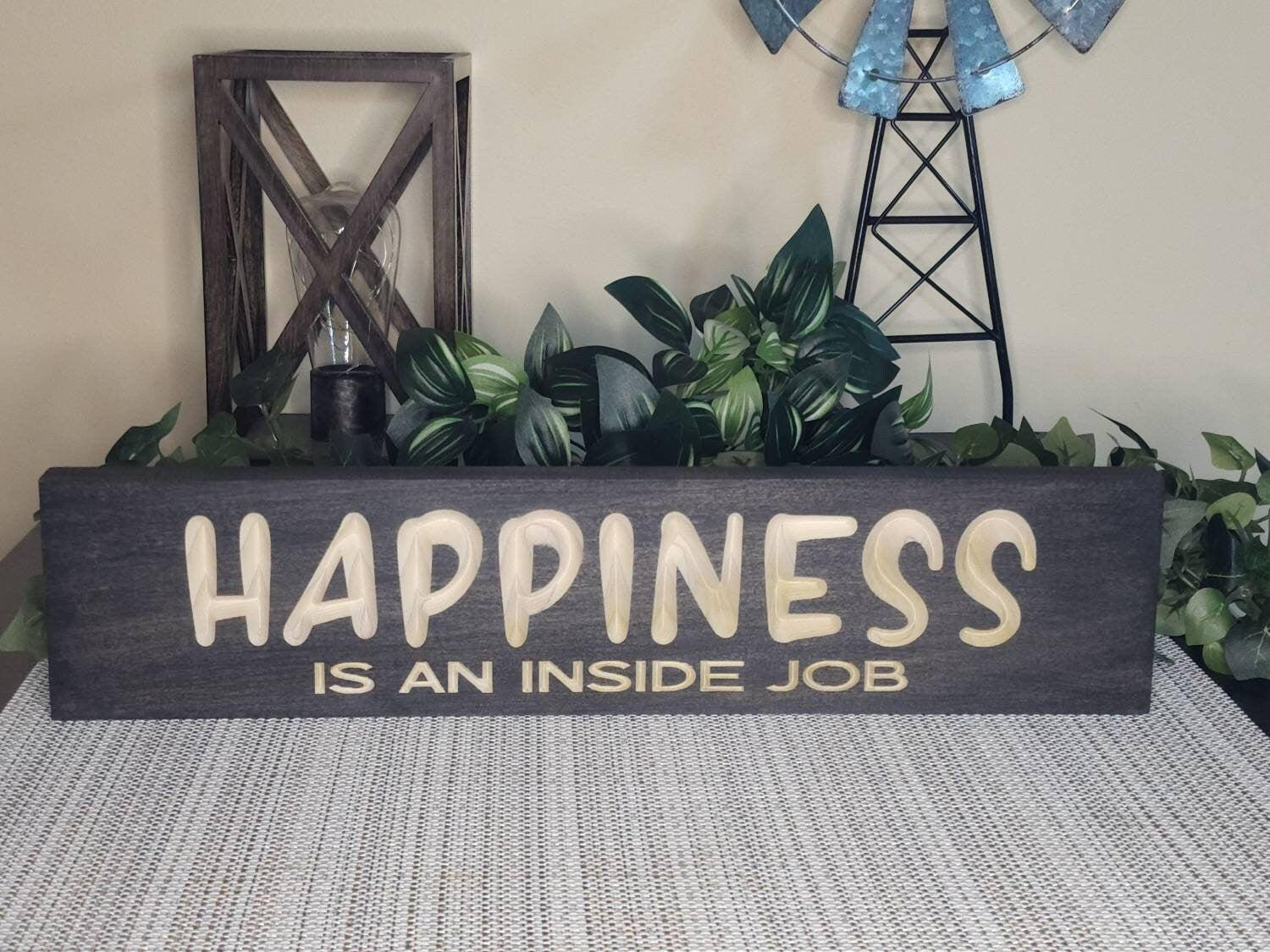 Inspirational wood sign with mindfulness décor in a meditation space.
