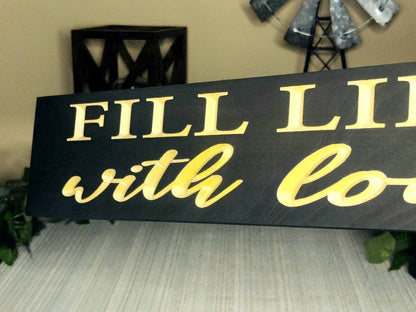 Inspirational wooden love sign for bedrooms and serene spaces.

