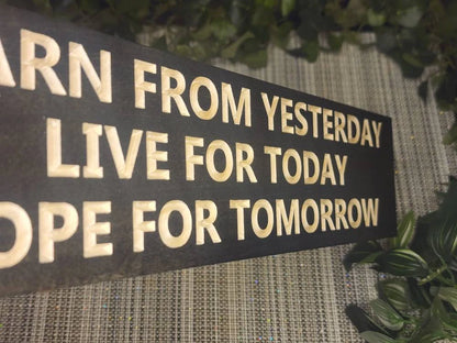 Mindfulness wall art placed in an entryway to welcome guests with an uplifting message.
