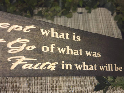 Motivational home decor sign with a rustic farmhouse finish, adding warmth to a family room.
