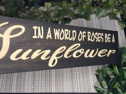 Motivational sunflower-themed wooden sign used as gift decor for nature lovers.

