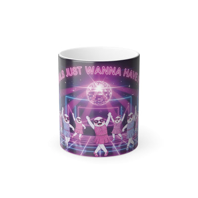 Mug with a colorful design of people dancing and a disco ball, with text 'ghouls JUST WANNA HAVE FUN' on a white background.
