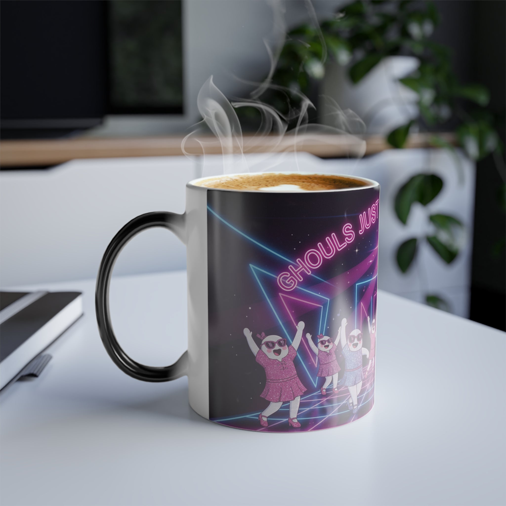 Mug with a neon design and text on a desk with steam rising from it