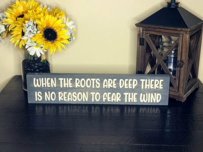 Nature-inspired decor, deep roots sign, rustic wood sign, family strength sign.
