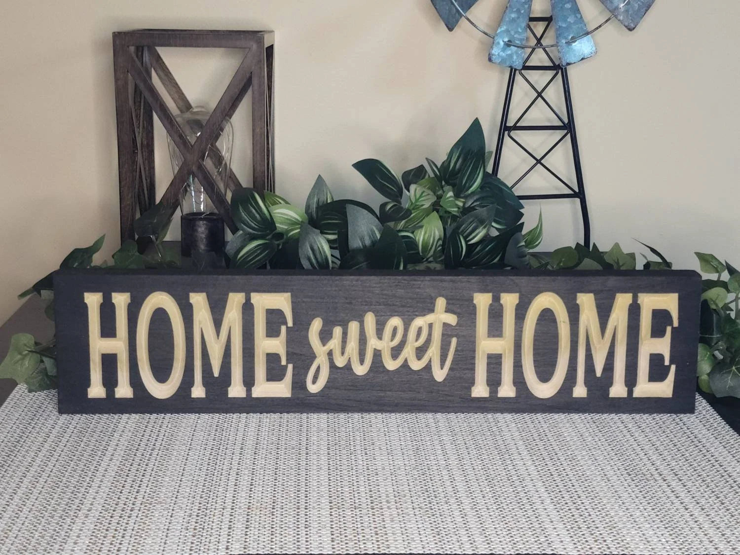 Personalized Home Sweet Home wall art styled in a cozy living room.
