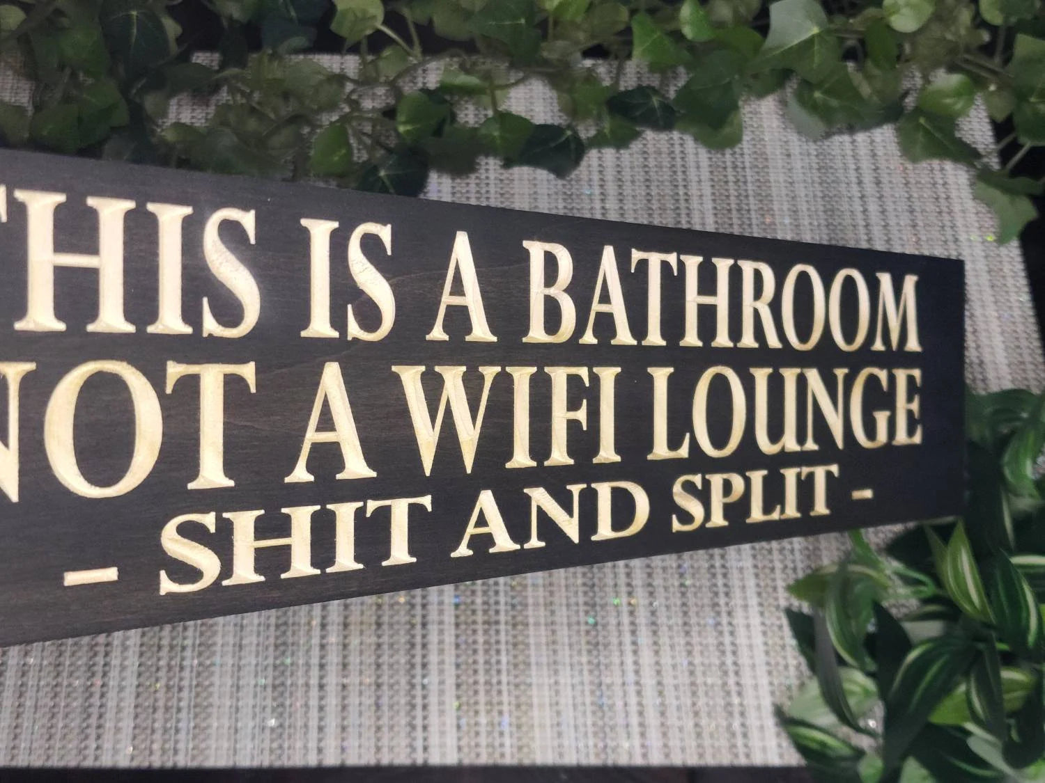 Personalized bathroom wall art with a hilarious message for guests.
