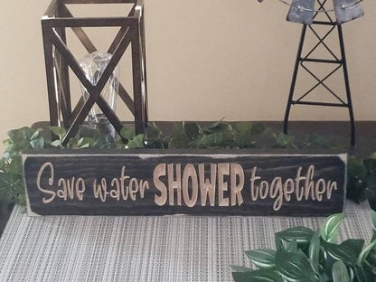 Personalized wooden bathroom sign with farmhouse-style finish options.
