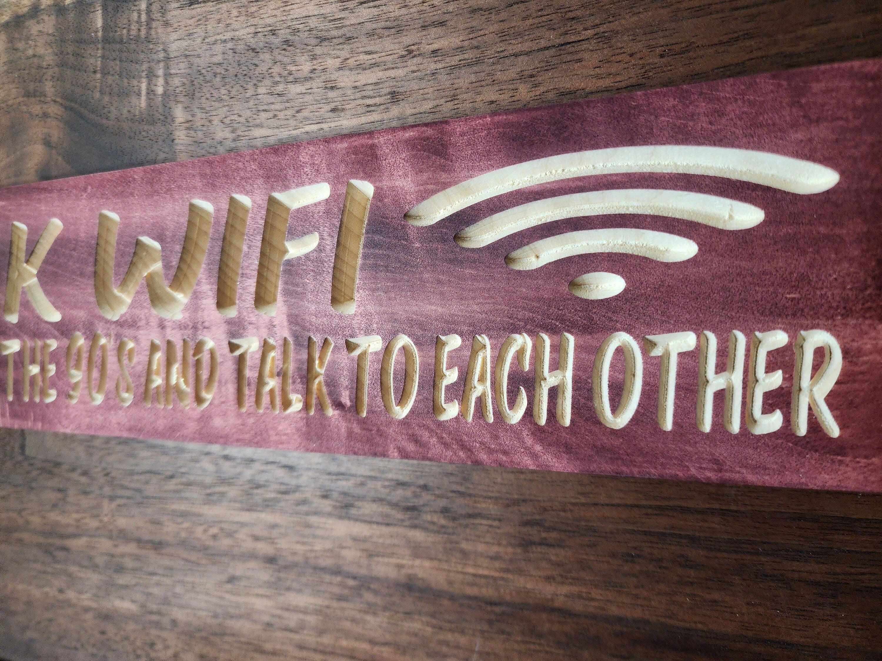Quirky weak WiFi wall art for cafés and family spaces with unplugged themes.
