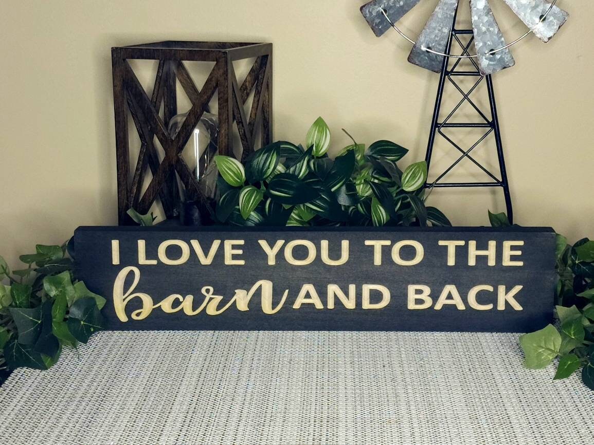 Romantic barn-themed love sign for country homes and rural romance decor.
