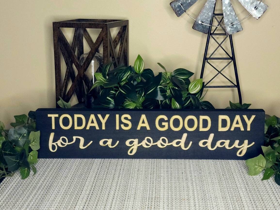 Rustic motivational sign with an uplifting quote for home décor.
