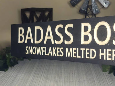 Rustic office decor sign with humor and motivation for managers.
