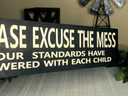 Rustic wood sign with a funny family quote perfect for moms and dads.
