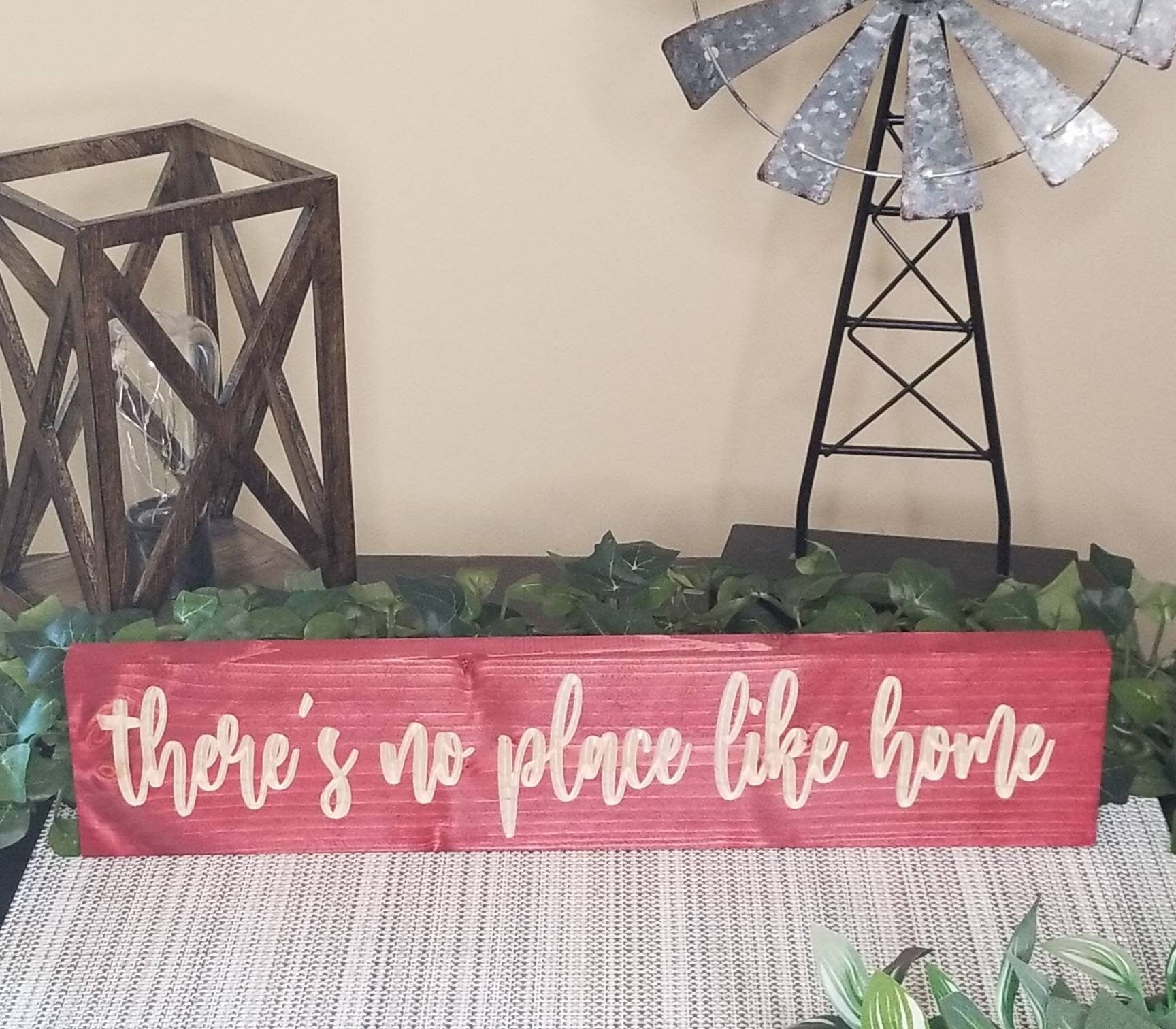 Sentimental home decor sign placed in a welcoming entryway.
