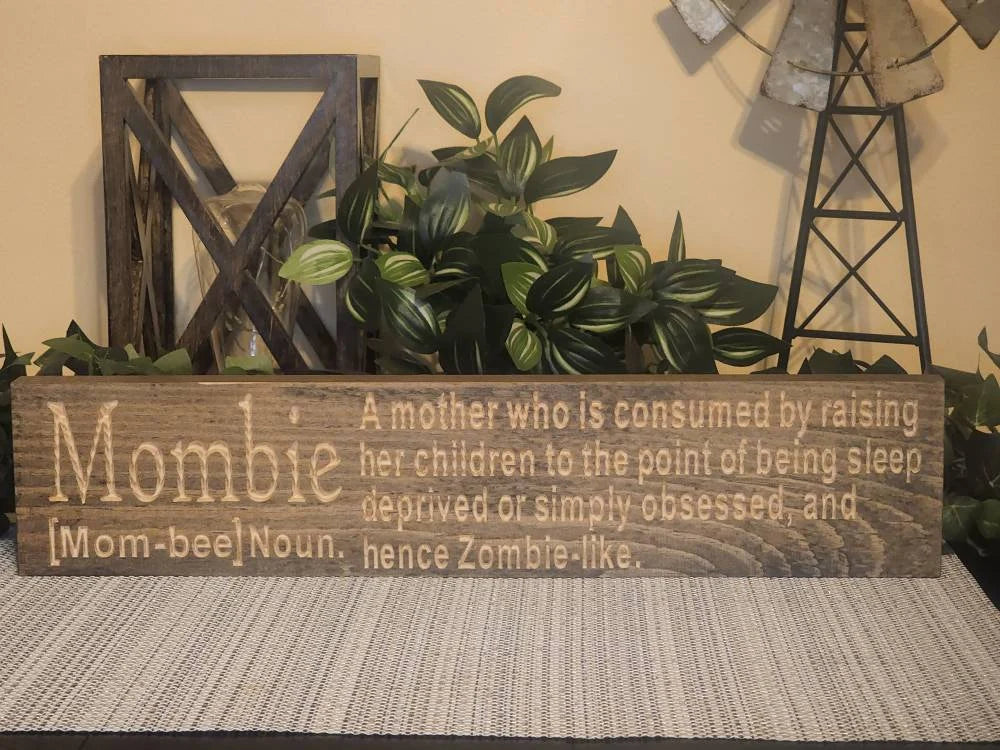 Sleep-deprived mom decor with humorous mombie sign definition