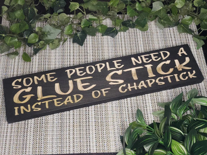 Some People Need a Glue Stick Instead of Chapstick funny wood sign for sarcastic wall art.

