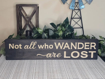 Travel-inspired wall art with a wanderlust quote, perfect for free-spirited home decor.

