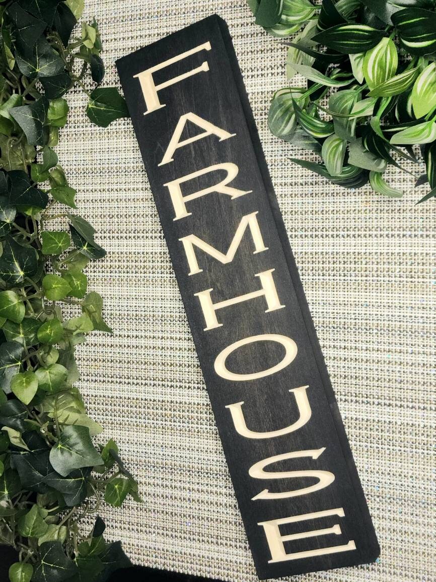 Vintage farmhouse wall art displayed in a welcoming entryway.
