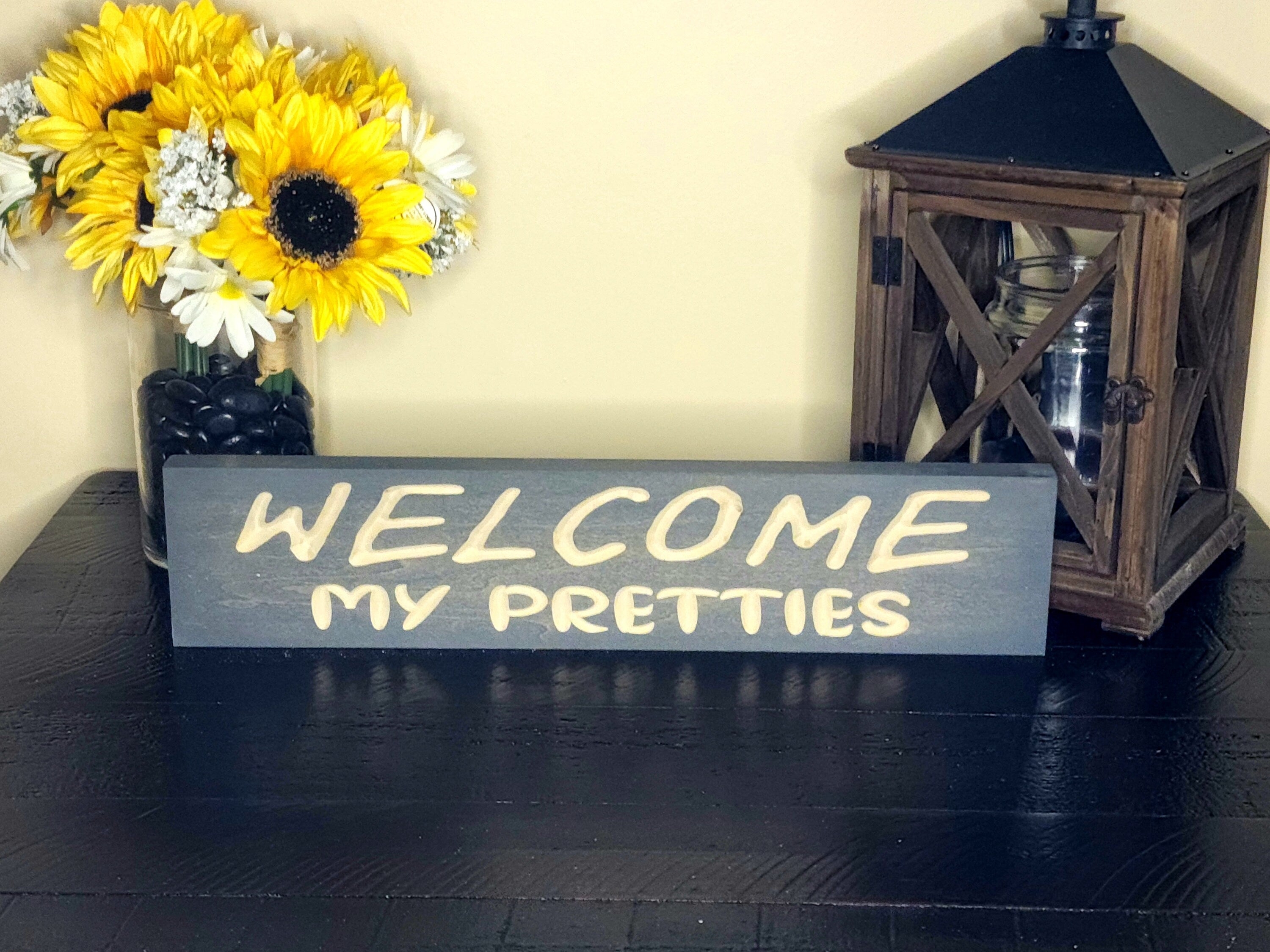 Witchy-themed Halloween welcome sign for front doors and entryways.
