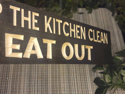 Witty dining humor sign for kitchen or dining room wall decor with a playful tone.
