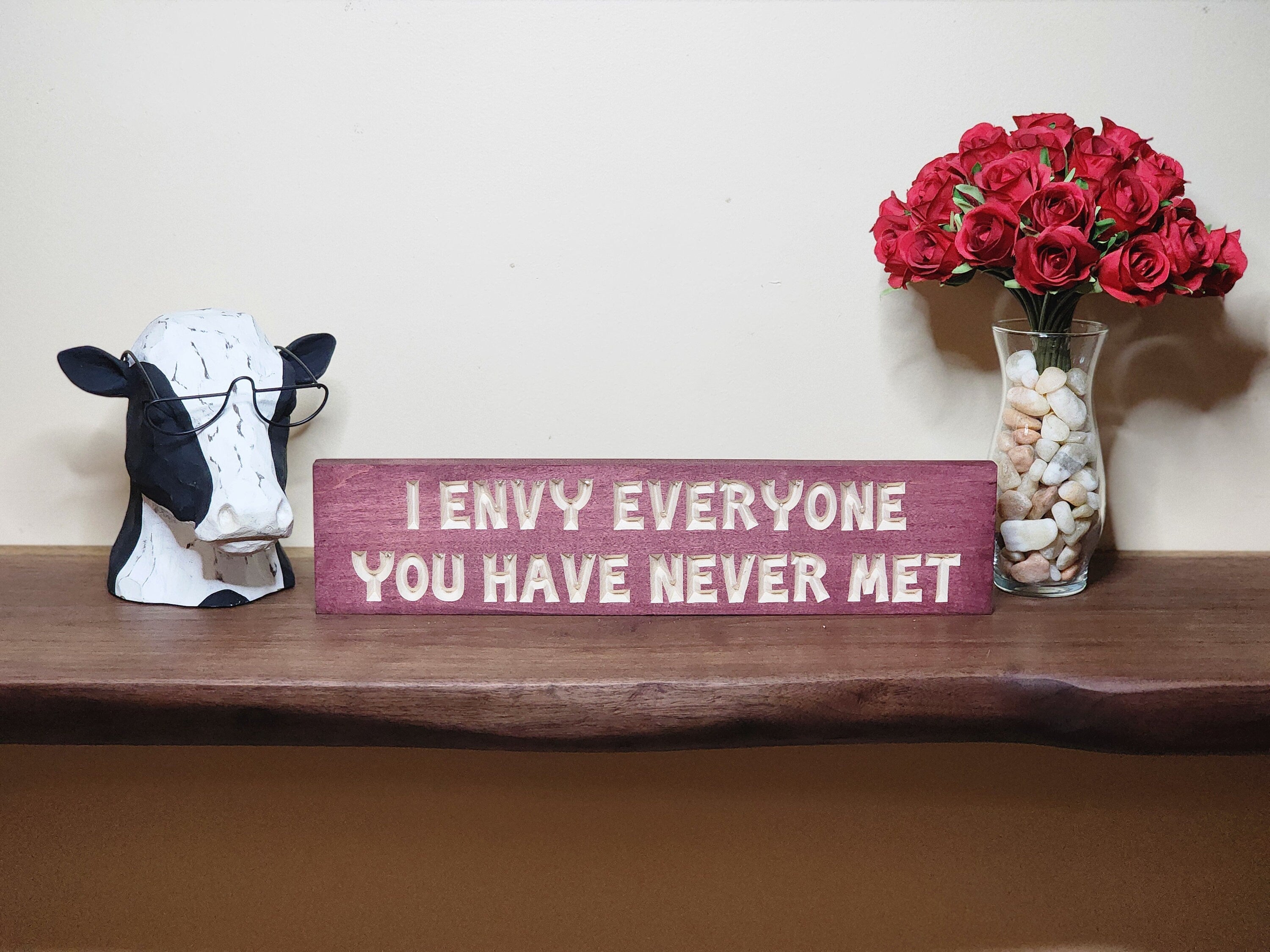 Witty quote wall art for bedrooms, offices, and playful living room accents.
