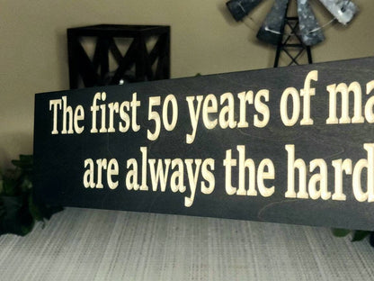 Wooden anniversary gift sign for parents or couples celebrating 50 years together.
