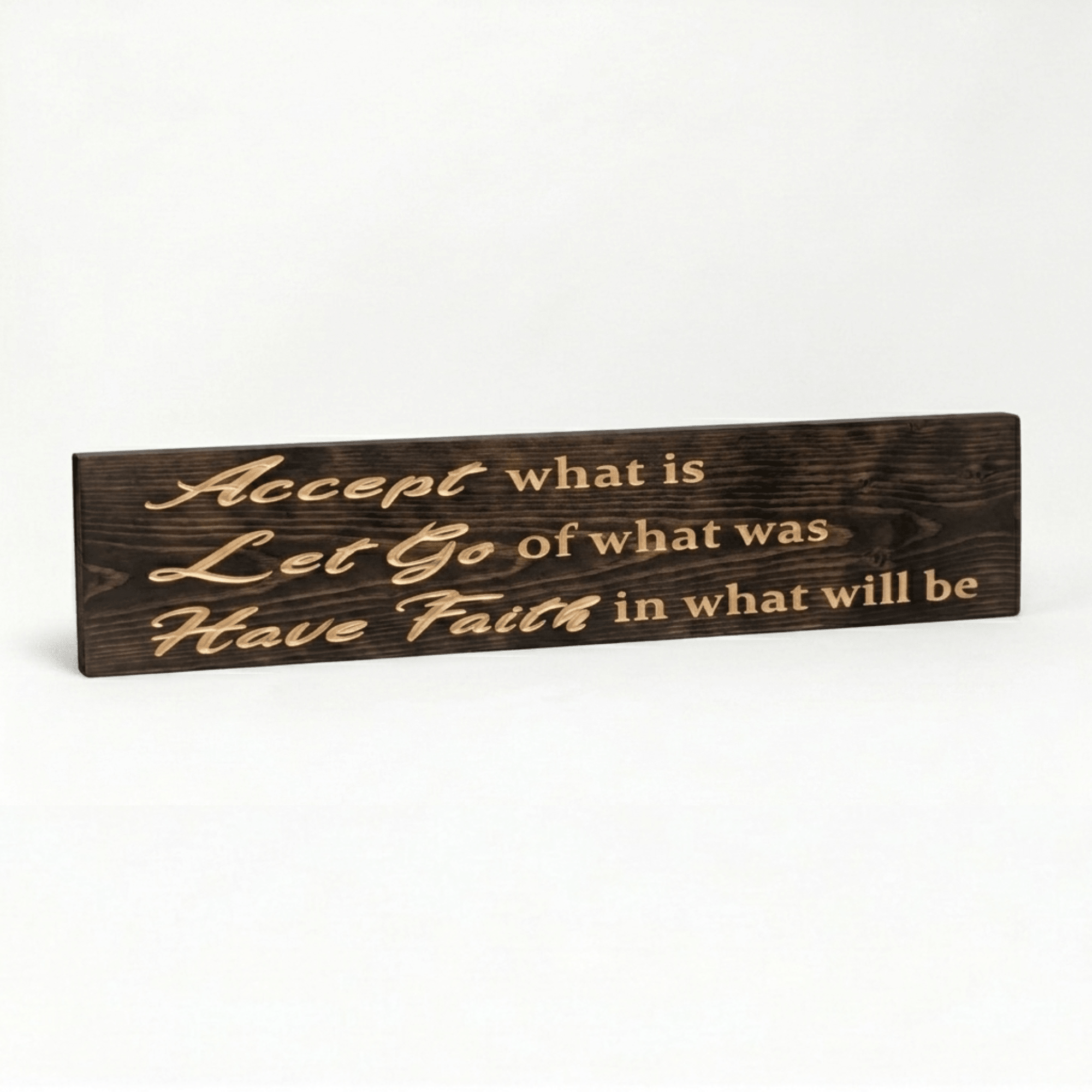 Accept What Is Let Go of What Was Have Faith in What Will Be CNC-carved wooden mindfulness sign on white background.