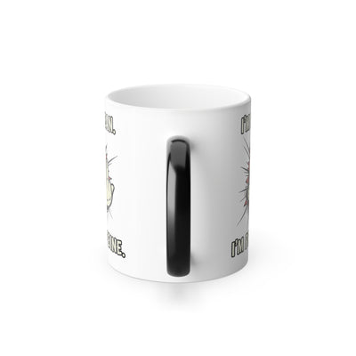 Back view of the ceramic mug, showing the black handle and the revealed white surface.