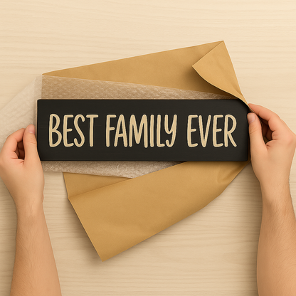 Best Family Ever wooden sign being unwrapped – handcrafted gift décor