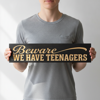 Beware Halloween Sign — Beware, We Have Teenagers — shown to scale, held — Bluegrass Gifts